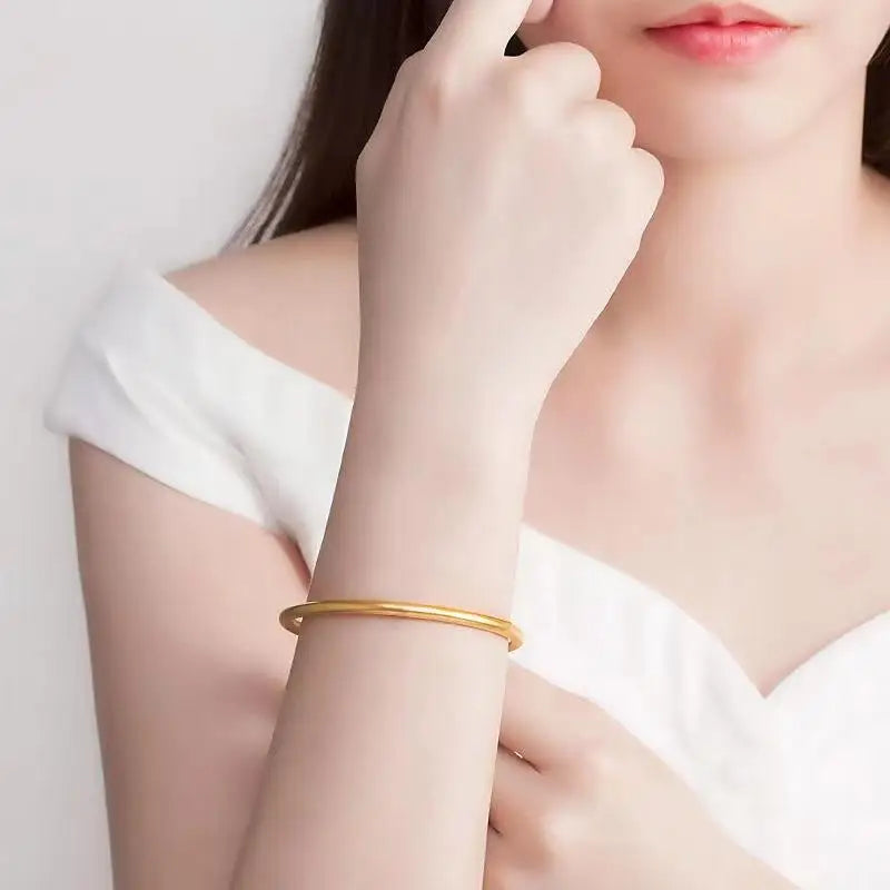 Women Bracelet in Elegant Gold Round Minimalist Design Perfect for Classic Fashion