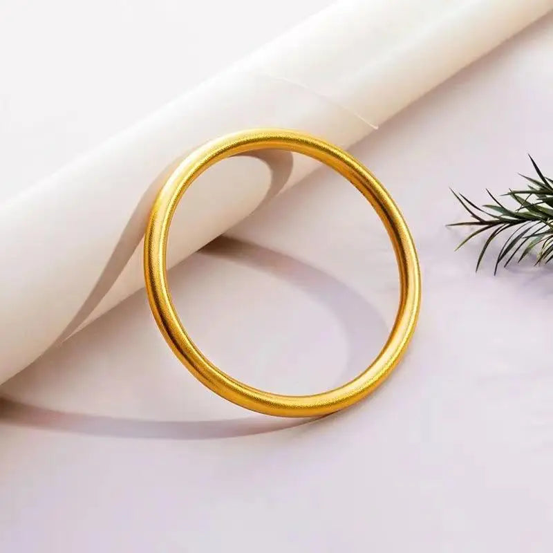 Women Bracelet in Elegant Gold Round Minimalist Design Perfect for Classic Fashion