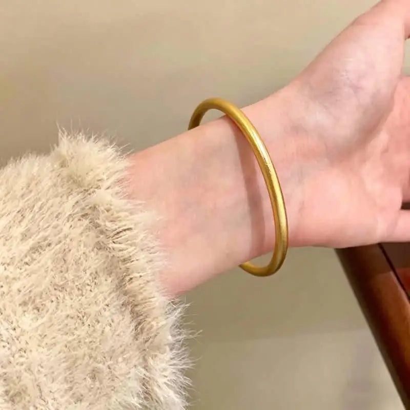 Women Bracelet in Elegant Gold Round Minimalist Design Perfect for Classic Fashion